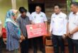 Asbulloh, Warga Kecamatan Katibung Terharu Dapat Bantuan Bedah Rumah dari Bupati